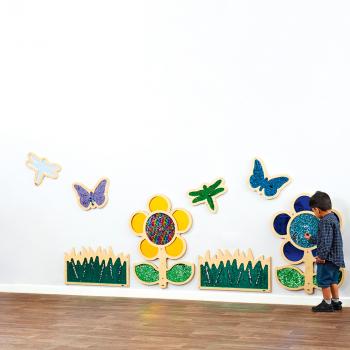Wanddekoration mit Streichpailletten - Blume, blau