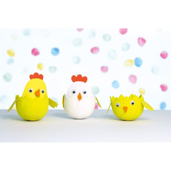 Küken in Eierschalen